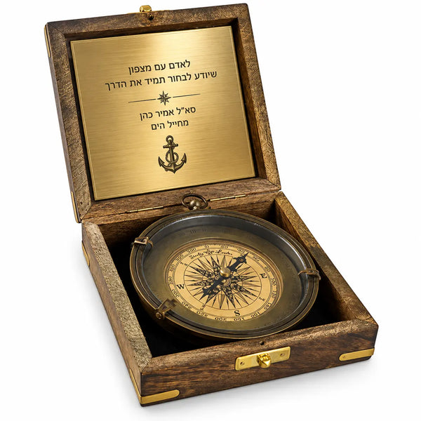 Large, ornate compass with a copper base in a wooden box