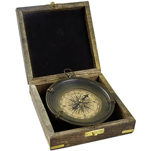 Large, ornate compass with a copper base in a wooden box